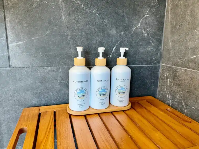 Luxury bathroom amenities with white bottles in Cape May La Mer bathroom