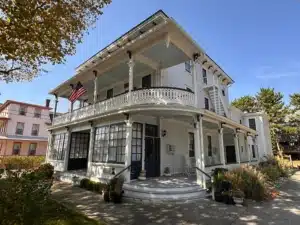 Classic white colonial home with wraparound porch in Cape May NJ vacation rental
