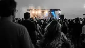 Crowd at a Cape May Promenade concert near Beach Avenue, capturing what is the nicest part of Cape May at night