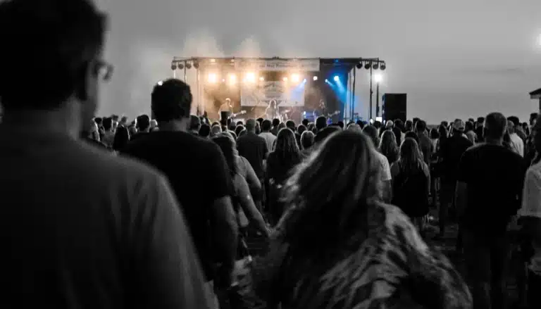 Crowd at a Cape May Promenade concert near Beach Avenue, capturing what is the nicest part of Cape May at night